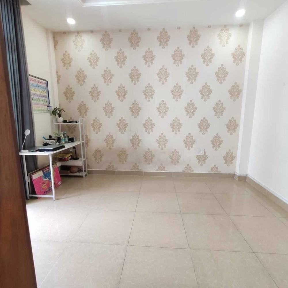 Cho thuê Nhà Nguyên  căn nhà HXH đường 11 p. trường thọ - 3 tầng có 4pn3wc, sân để xe giá 13tr